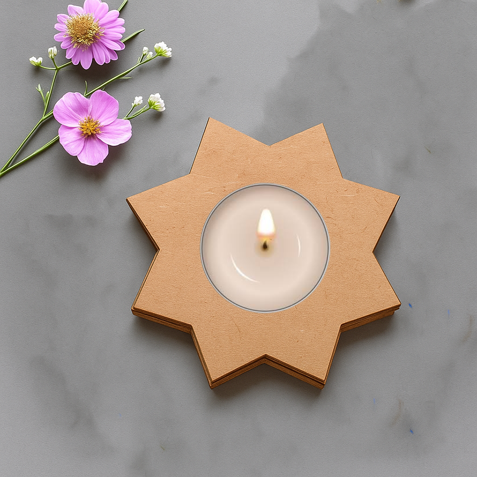 Flower shape MDF tea light candle holder with lit candle and floral decoration on marble surface
