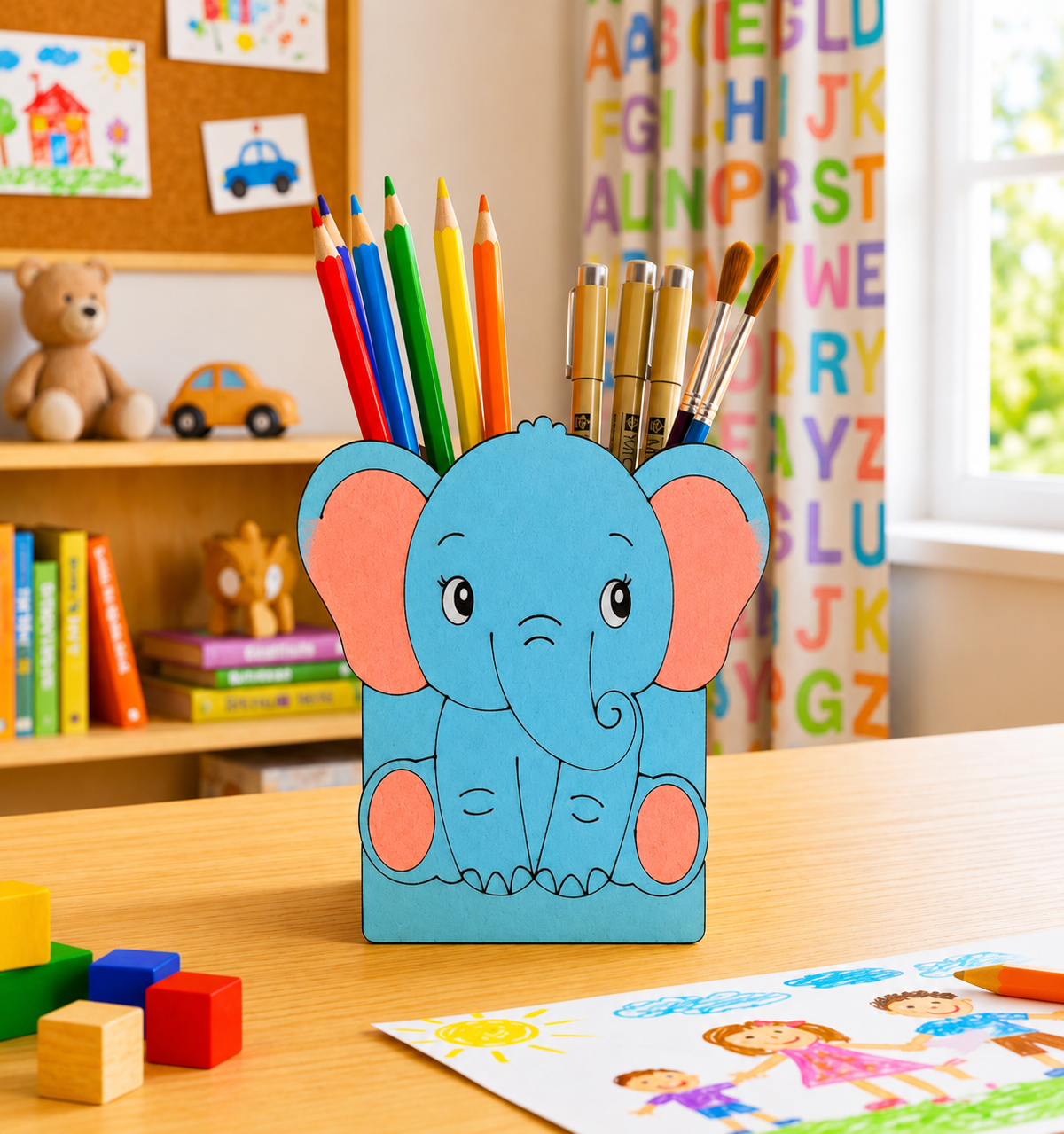 Children's desk with a MDF DIY  blue elephant pencil holder filled with colorful pencils, surrounded by toys and books.