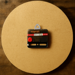 Small electronic component on a round wooden board.