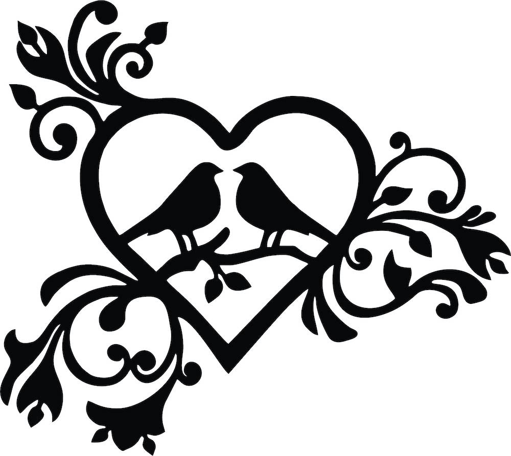 Romantic heart-shaped wall art with bird silhouettes and intricate floral designs, the image is the enlarged picture of the product.