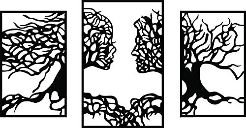 Black MDF tree wall decor featuring a stunning three-panel design with intricate branches forming abstract faces, the image is the enlarged picture of the product.