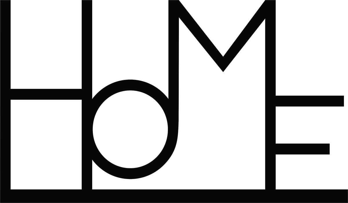 Minimalist black 'Home' wall decor focusing on the product.