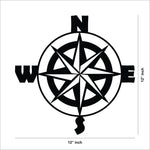 Black wall art featuring a compass design with cardinal directions (N, S, E, W), showing the dimensions of the product that is 12 inch by 12 inch.