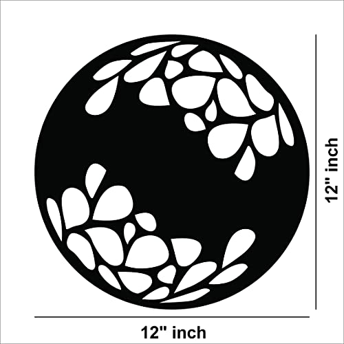 Circular black MDF wall art with abstract leaf-inspired cutout patterns, image shows the size of the product that is 12 inch in diameter.