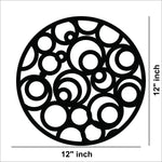 Circular black MDF wall art with abstract cutout patterns of overlapping circles, the image shows the size of the product that is 12 inch in diameter.