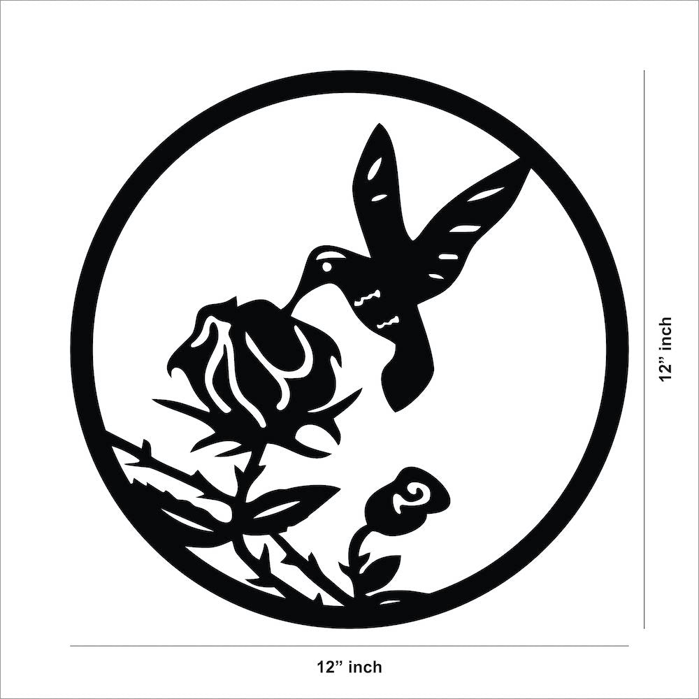 Circular hummingbird wall art in black featuring a bird hovering near a rose, the image shows the dimensions of the product that is 12 inch by 12 inch.