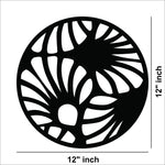 Circular black MDF wall art with an abstract cutout design resembling flowing patterns, the image shows the size of the product that is 12 inch in diameter.