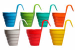 The side angle of the Set of colorful hanging plastic planters in blue, green, red, orange, yellow, and white with 'Go Green' embossed design.