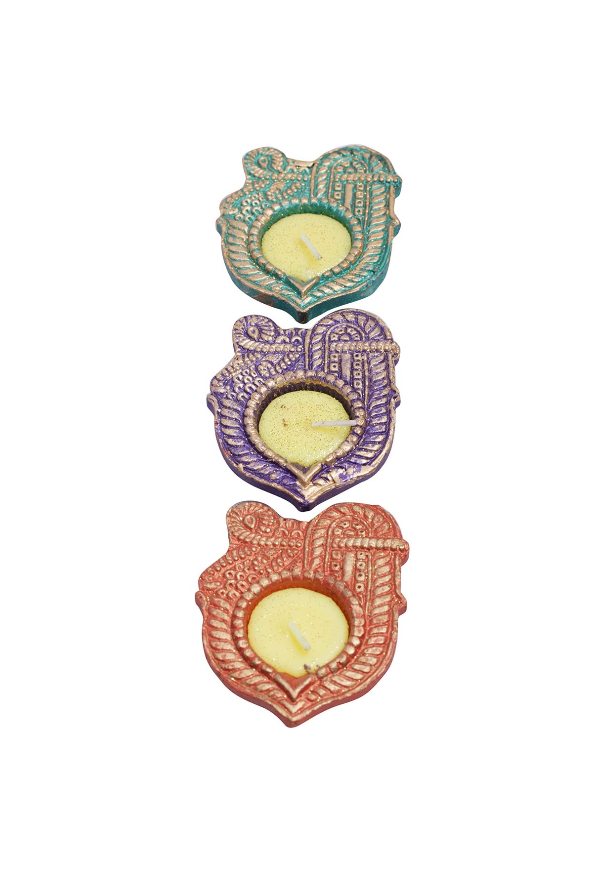 Shri‑shaped decorative diya candles arranged in colorful set 