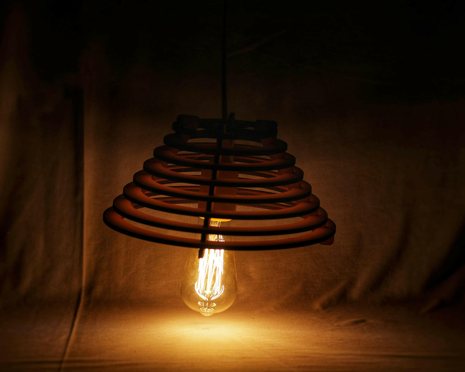 Handcrafted MDF spiral pendant lamp with warm ambient glow – ideal for restaurants, cafes, homes, and offices

