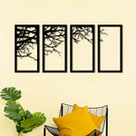 Tree silhouette wall art with a four-panel design displayed on a light wall above a modern chair with yellow cushions.