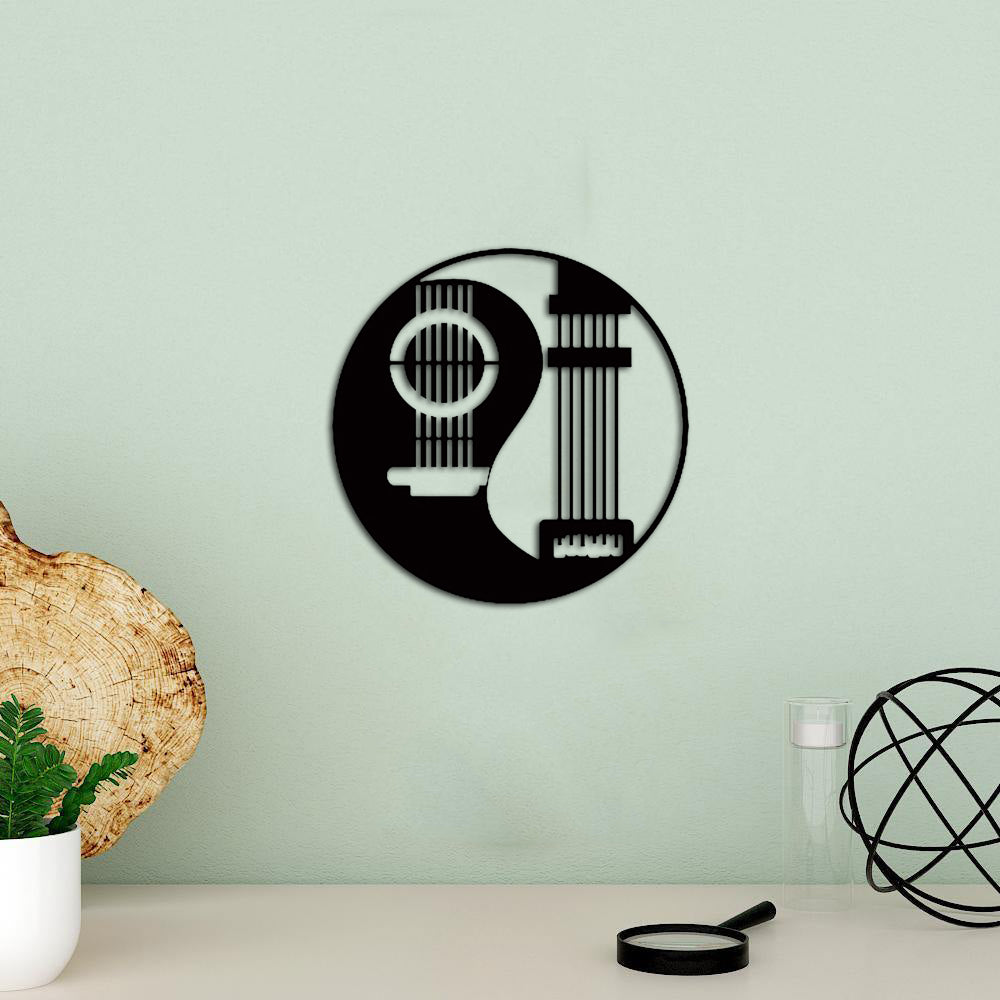 Music-inspired wall art featuring a circular design with abstract musical instruments on a pastel green wall.