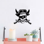 Black MDF pirate skull wall decor with crossed swords, adding a bold and adventurous touch to a modern interior.