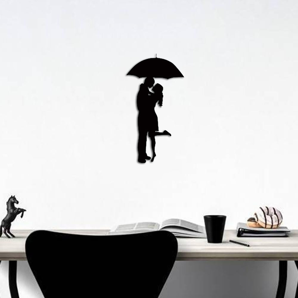 Romantic black mdf wall art featuring a couple embracing under an umbrella, adding love and elegance to home decor.