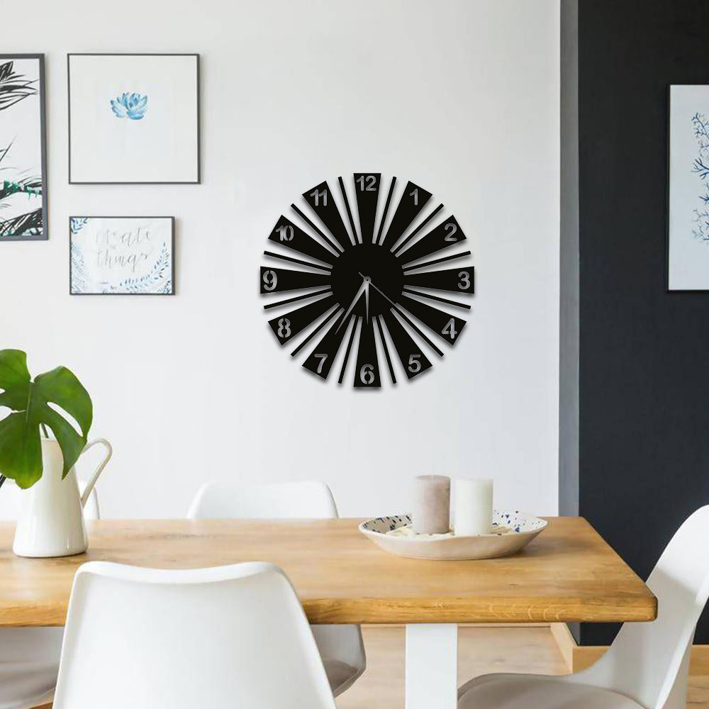 Modern black MDF wall clock with a sleek radial design, enhancing a contemporary dining space.