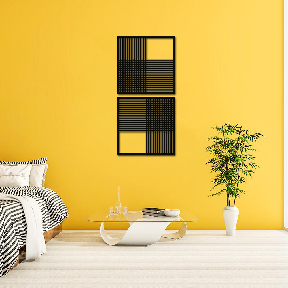 Black geometric abstract wall art featuring two framed designs with lines and patterns, mounted on a bright yellow wall in a modern bedroom setting.