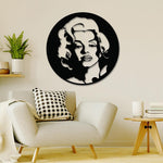 Round wall art featuring a stylized portrait of Marilyn Monroe in black and white.