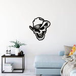 Stylish black cowboy skull wall art in a modern living room setting.