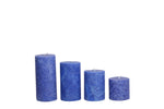 Set of four scented pillar candles in varying heights, for spa 