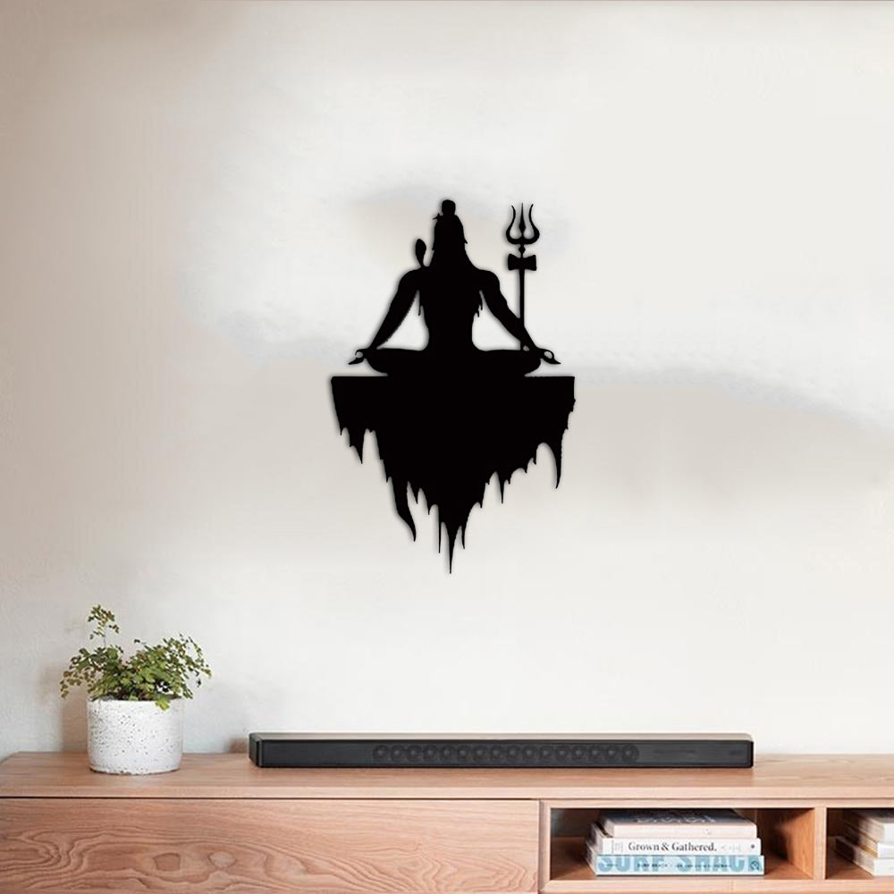 Black Lord Shiva wall art featuring a meditative silhouette of Shiva with a Trishul, mounted on a light-colored wall above a wooden console table.