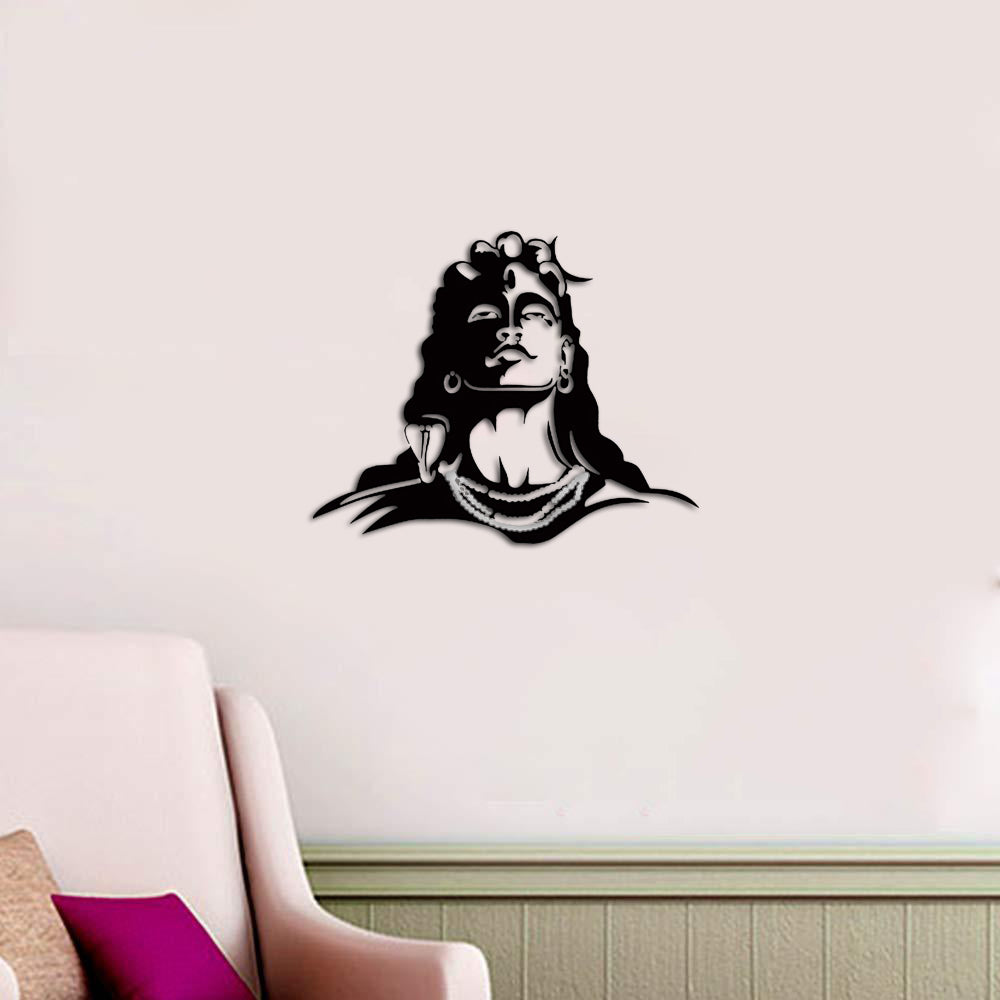 Black Mahadev wall art featuring an artistic depiction of Lord Shiva with detailed facial features, mounted on a beige wall above a cozy seating area.